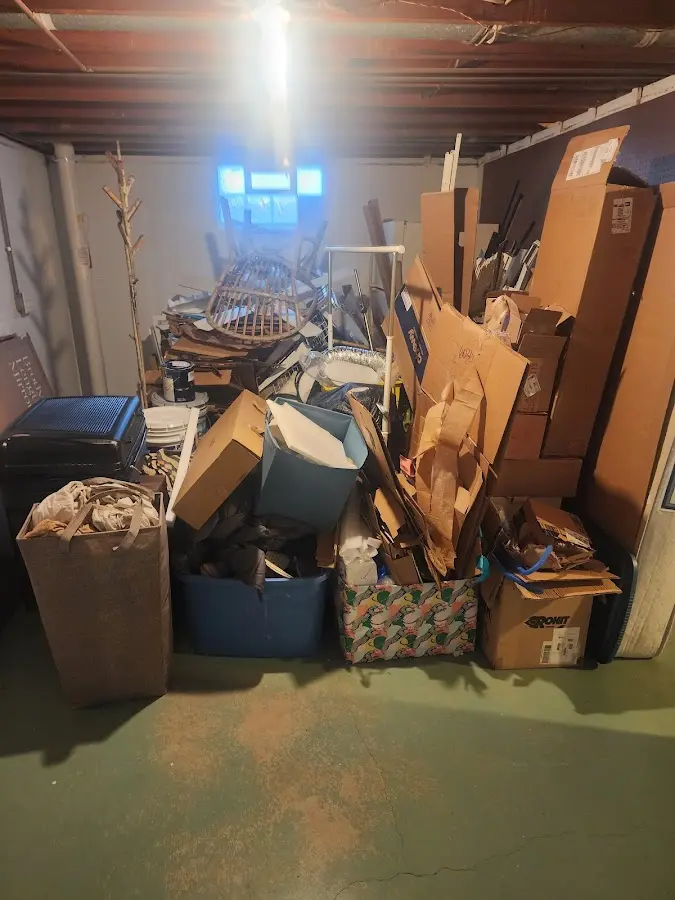 Roll-off dumpster container at job site for 4 Yard Dumpster Rental in Washington Terrace